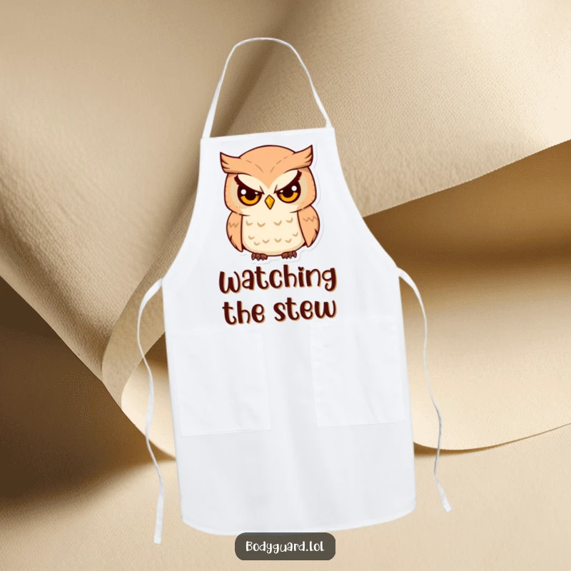 Funny Owl Survey Apron with a serious-eyed owl humorously watching over the kitchen and protecting the wearer.