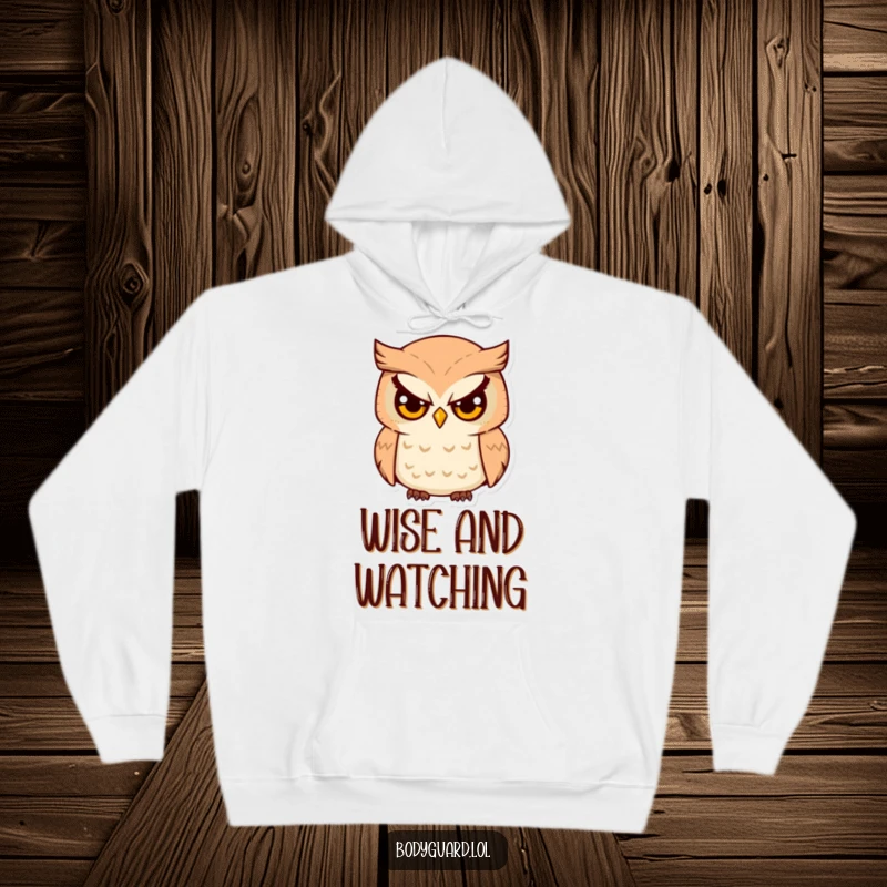 Funny Owl Watcher Hoodie featuring a serious-eyed owl humorously surveying its surroundings, offering warmth and witty style.